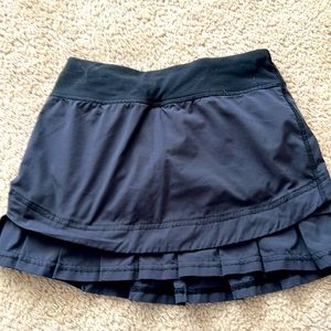 Ivivva black pleated skirt